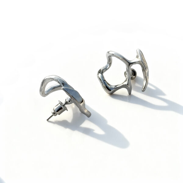 Silver ear cuffs